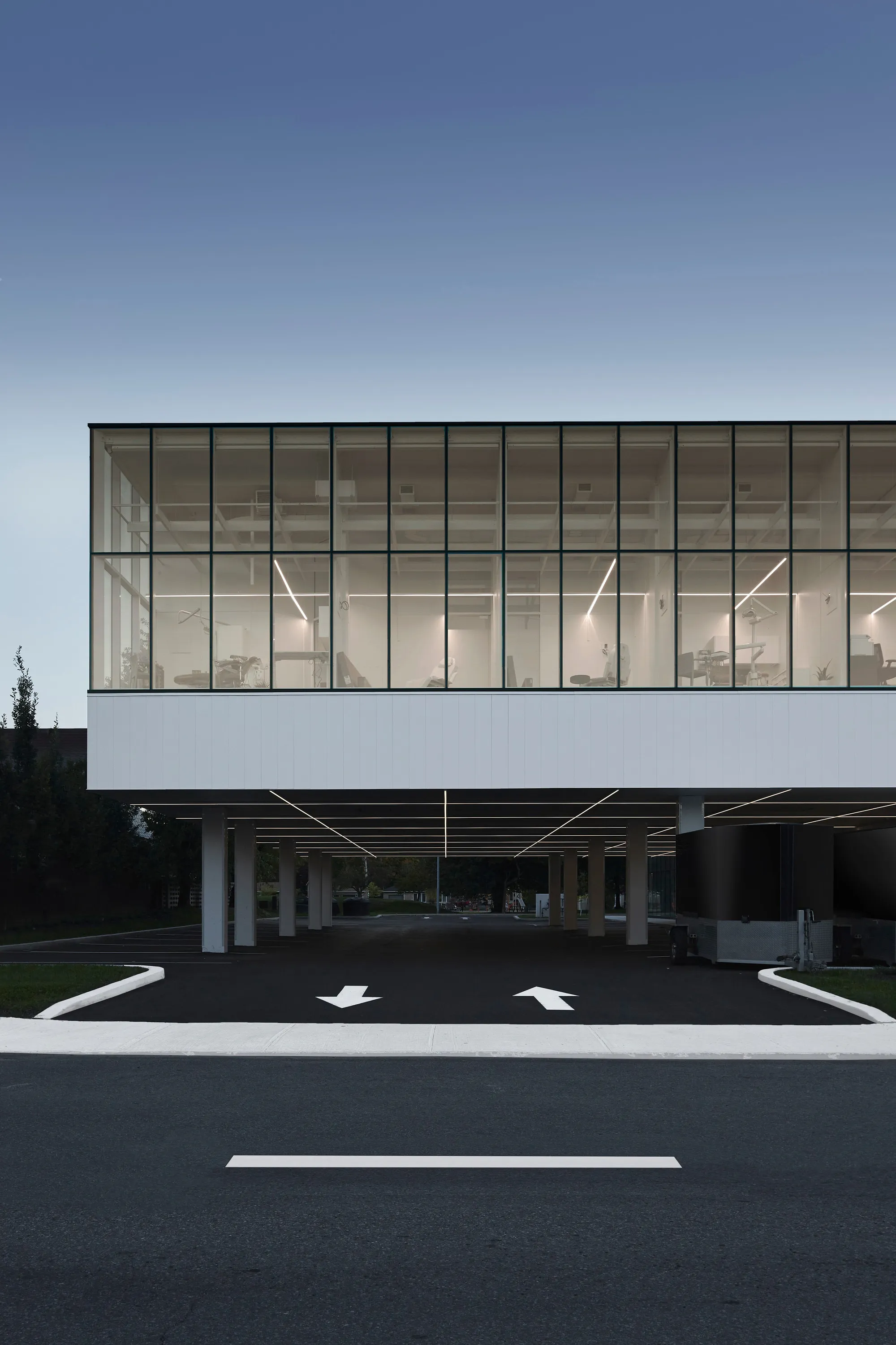Jean Verville Turns a Forgotten Lot in Longueuil into a Glass Dental Clinic Rooted in Biophilia