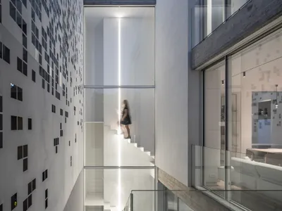 Anderman Architects Build a Gradient Wall That Dissolves a Tel Aviv House into Light