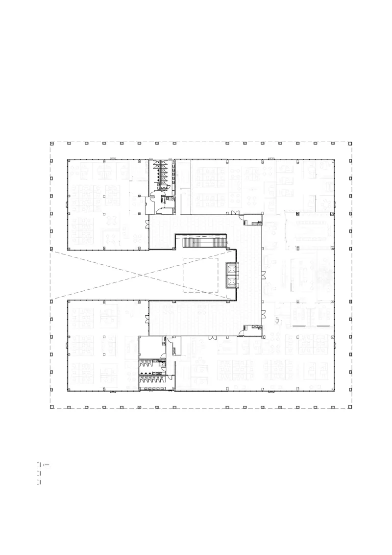 Floor plan drawing showing open interior spaces with service cores and diagonal circulation path