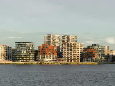 Powerhouse Company, Orange Architects, and NEXT Architects Build a Harbor District on Amsterdam's IJ