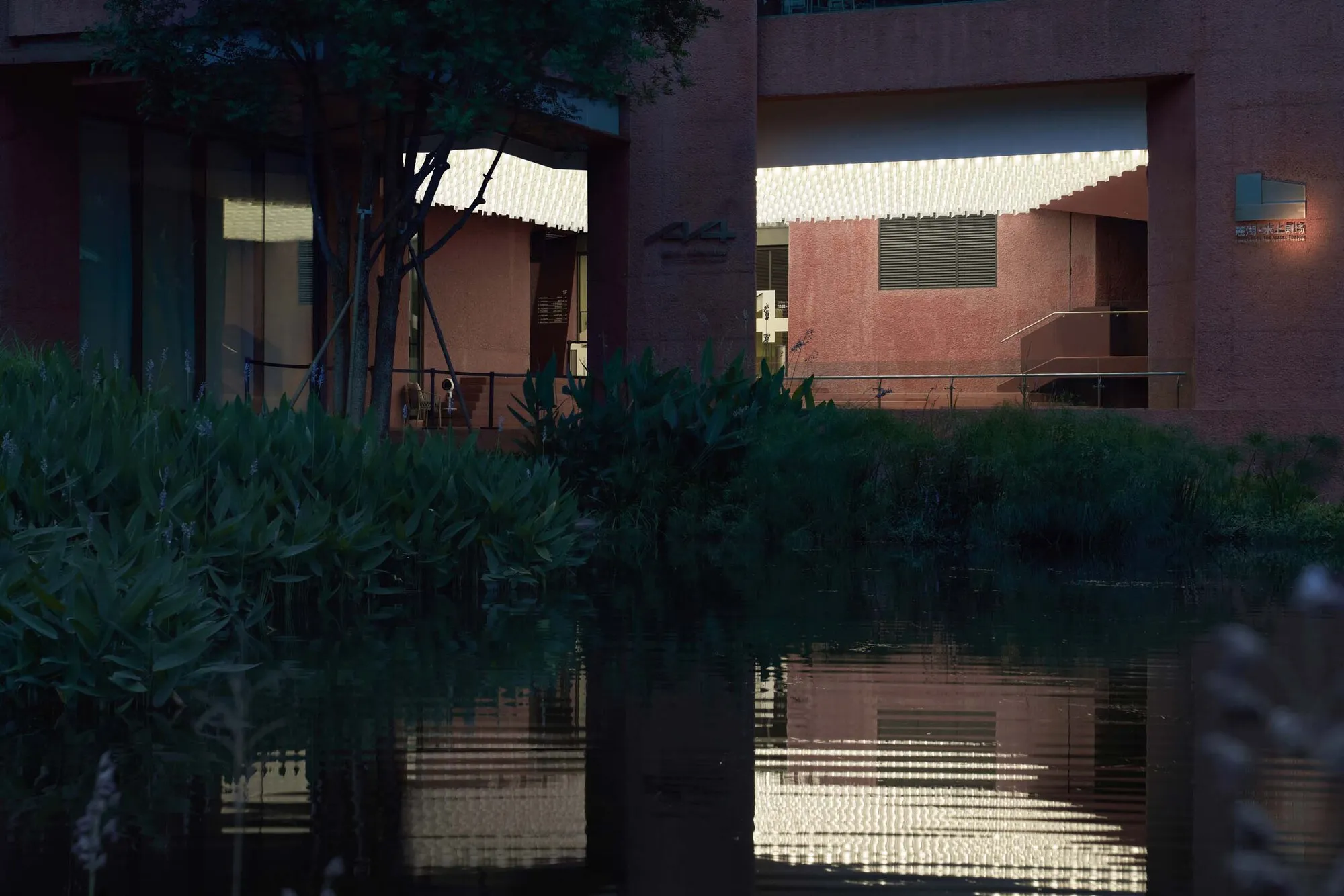 TEKTONN Architects Insert Sculptural Volumes into a Chengdu Garage to Create the A4 Art Museum