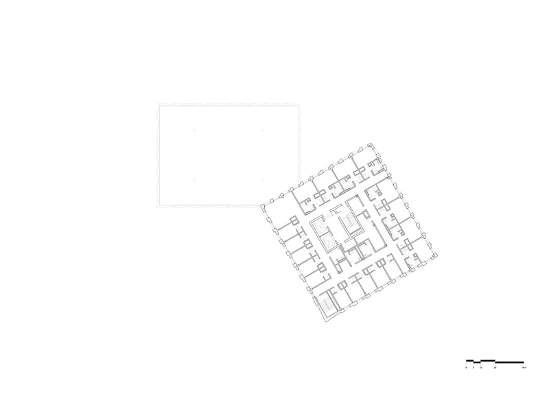 Floor plan drawing showing a single building volume positioned diagonally adjacent to a rectangular outline