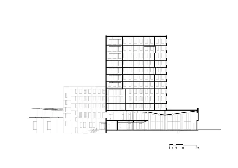 Section drawing showing the tower volume cut through its gridded facade with adjacent low-rise buildings in outline