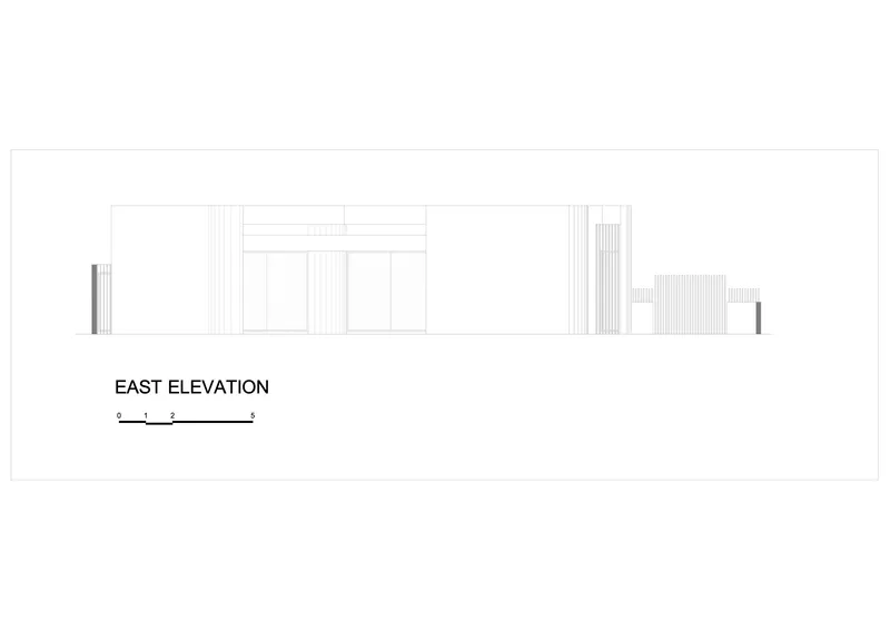 East elevation drawing showing flat roofline with vertical ribbed panels and central opening