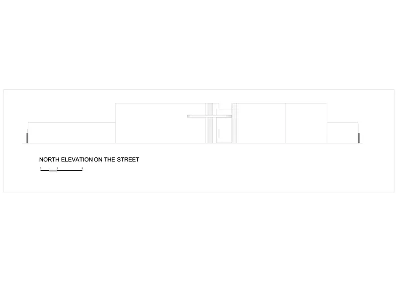 North elevation drawing showing street facade with recessed entrance between planar volumes
