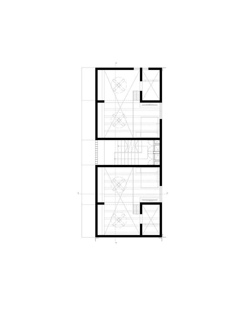 Floor plan drawing illustrating vertical residence with symmetrical room layouts and central stair core