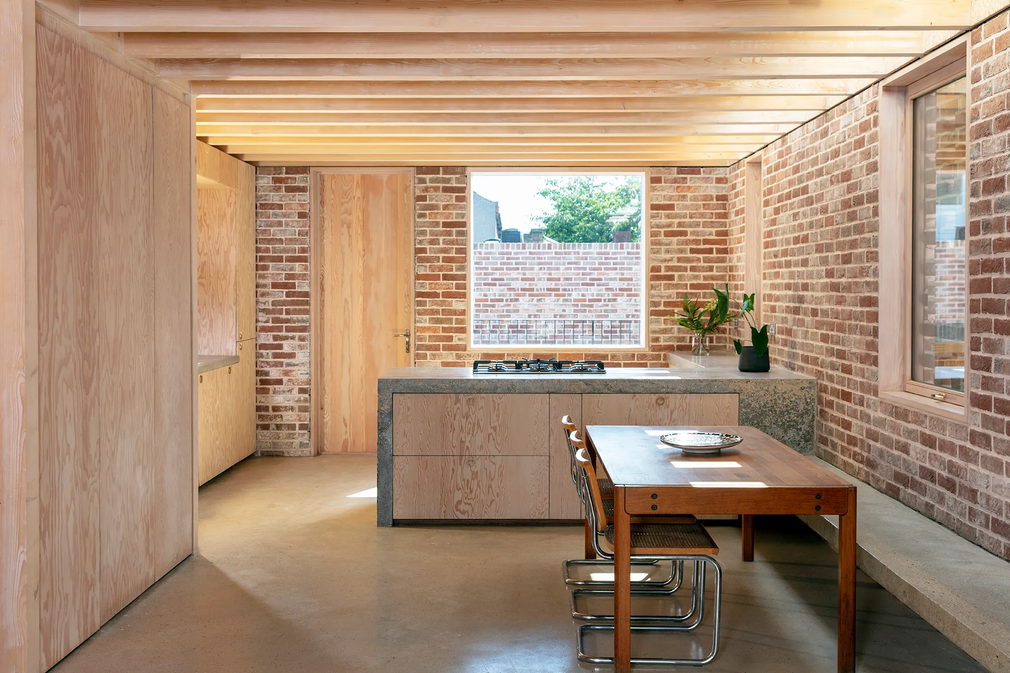 McMahon Architecture Carves a Three-Level Home from a Narrow Bomb Site in East London