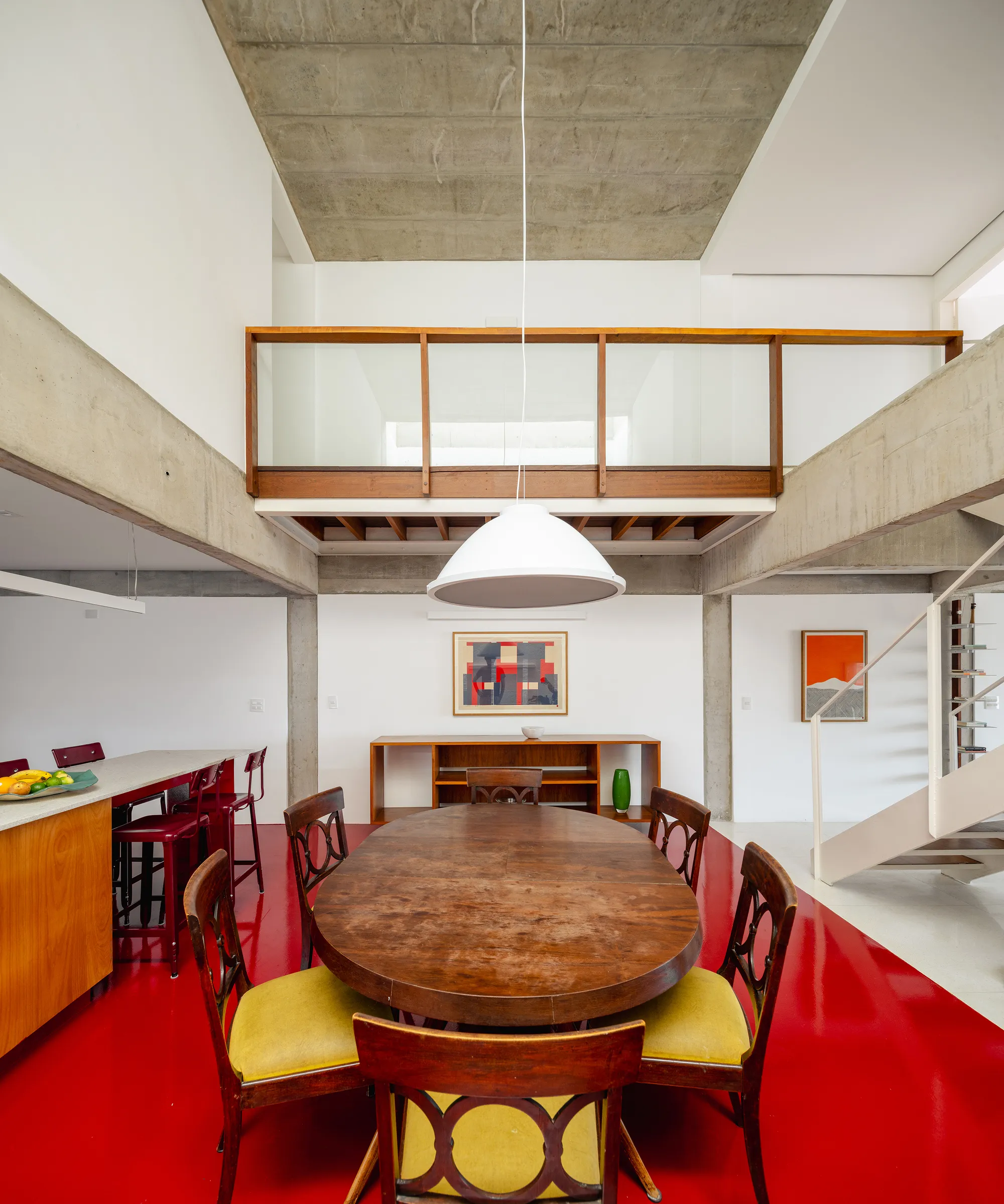 Trema Arquitetura and Gabriel Sepe Pour Red Resin Through a Brutalist São Paulo Hillside House