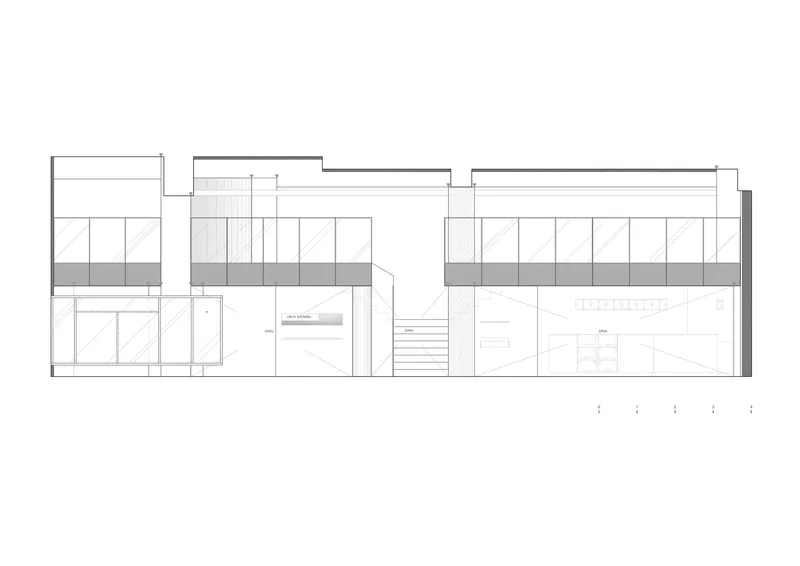 Section drawing showing split-level interiors with a central staircase and built-in shelving units