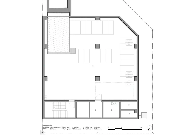 Floor plan drawing showing a garage and central stairwell on the lower level