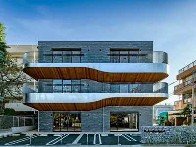 Organic Design Inc Shapes a Suburban Commercial Building as a Community Perch in Saitama