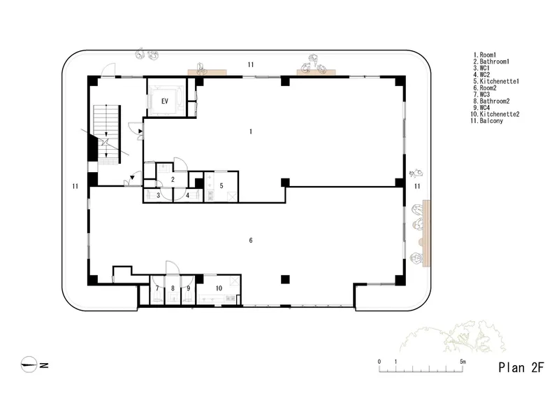 Second floor plan drawing showing large open spaces flanking a central service core with stair and elevator
