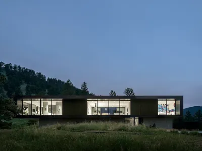 Studio B Wraps a Dark Metallic Box Around Light and Landscape on 42 Acres Above Boulder