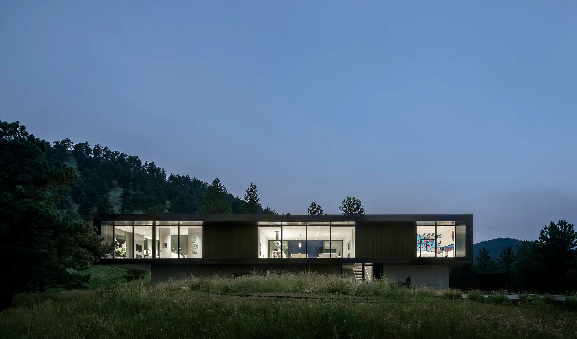 Studio B Wraps a Dark Metallic Box Around Light and Landscape on 42 Acres Above Boulder