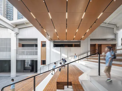Atelier Global Converts Two Shenzhen Gymnasiums into a Mountain-Inspired Academy