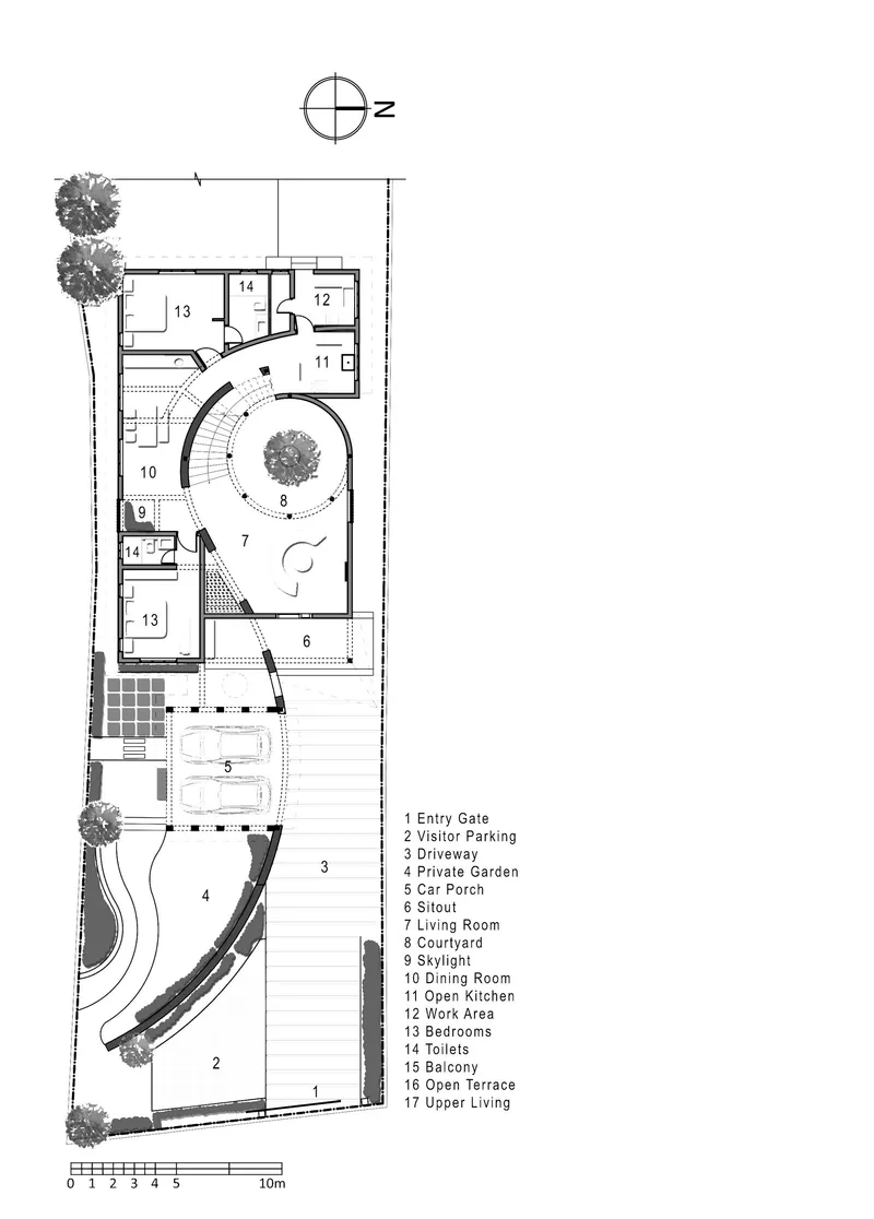 Ground floor plan drawing showing residential rooms arranged around a central circular courtyard with trees along the perimeter