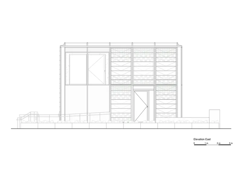 East elevation drawing showing facade with horizontal louvered panels and glazed entry on raised foundation