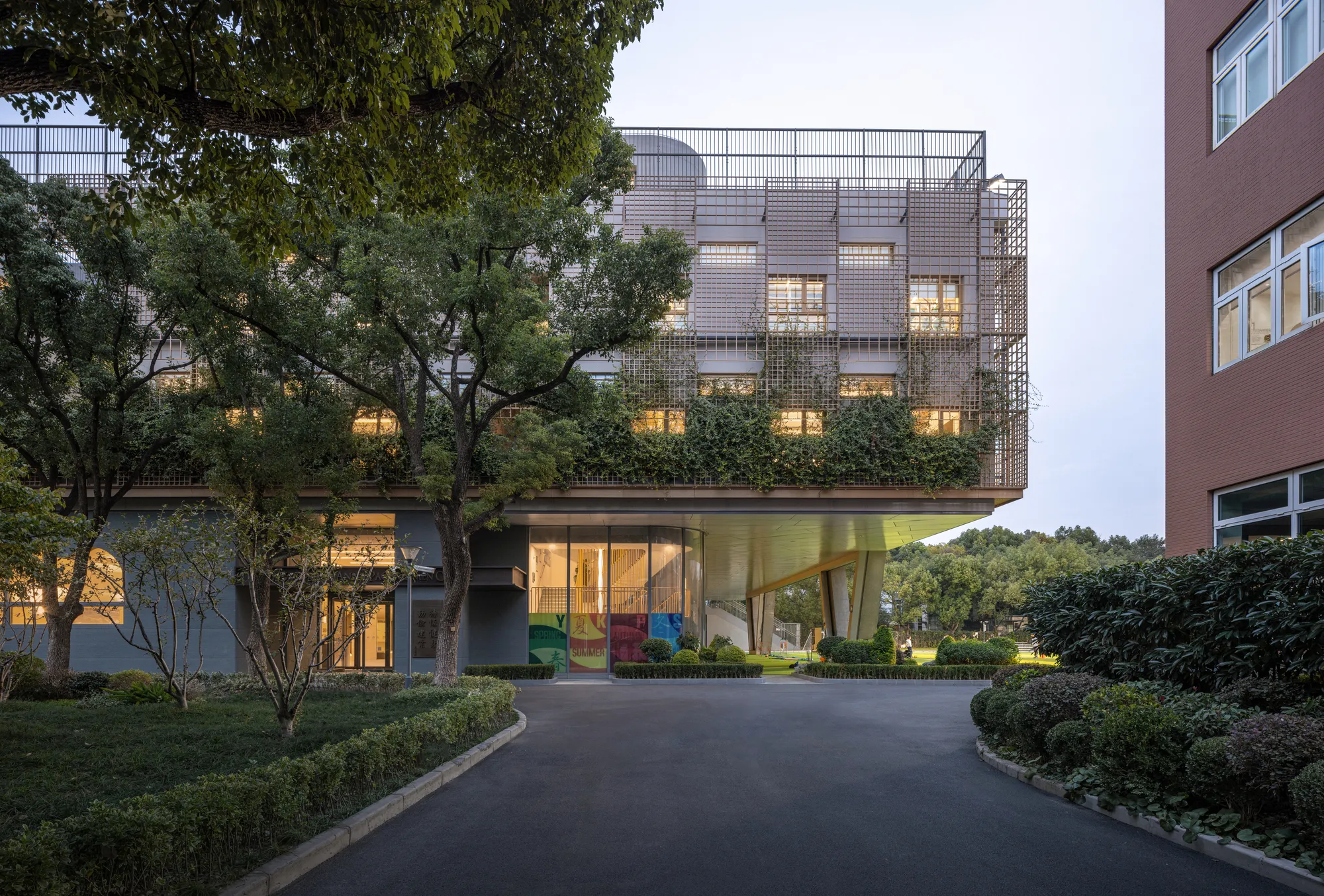 Scenic Architecture Office Lifts an Entire Sports Complex Above a Shanghai School's Playing Field