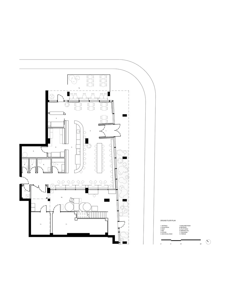 Ground floor plan showing the bar counter, dining zones, restrooms, and adjacent landscaped terrace