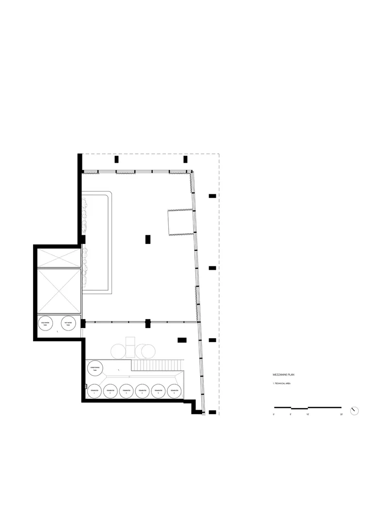 Mezzanine floor plan illustrating the upper level seating and service areas with central staircase