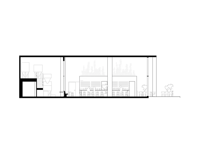 Section drawing displaying the double-height dining space with bar counter, mezzanine, and rooftop terrace