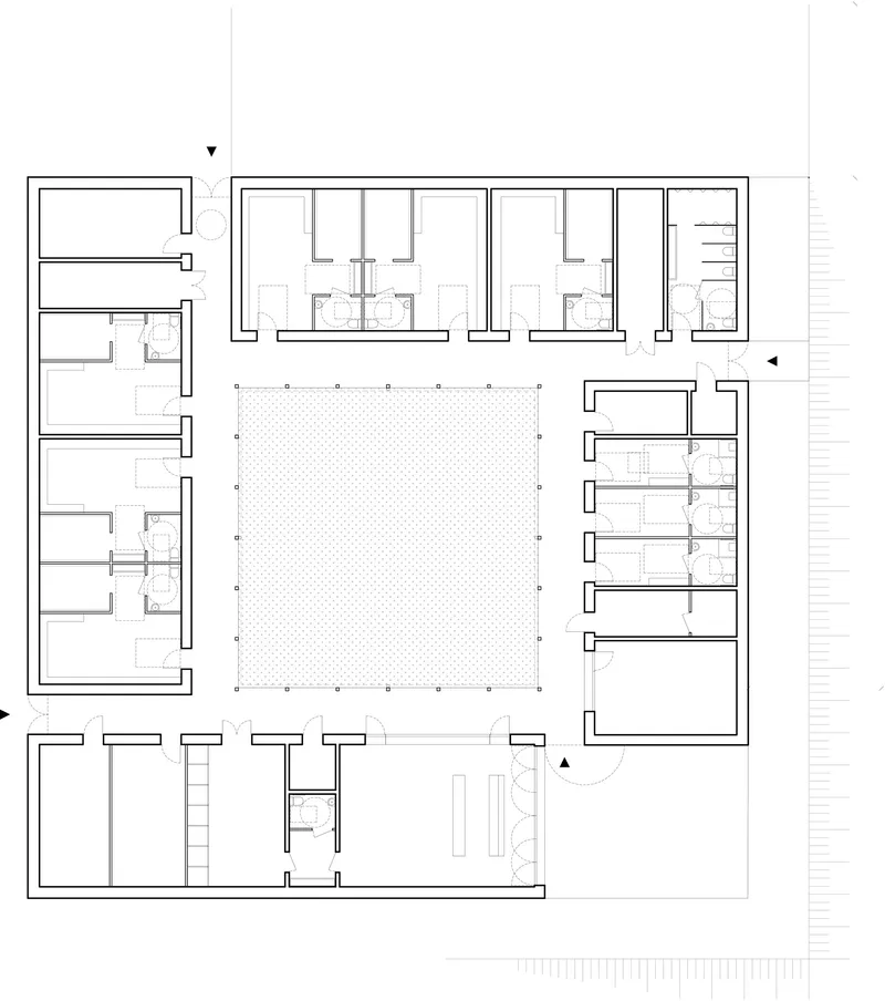 Floor plan drawing showing rooms surrounding a large central courtyard with perimeter columns