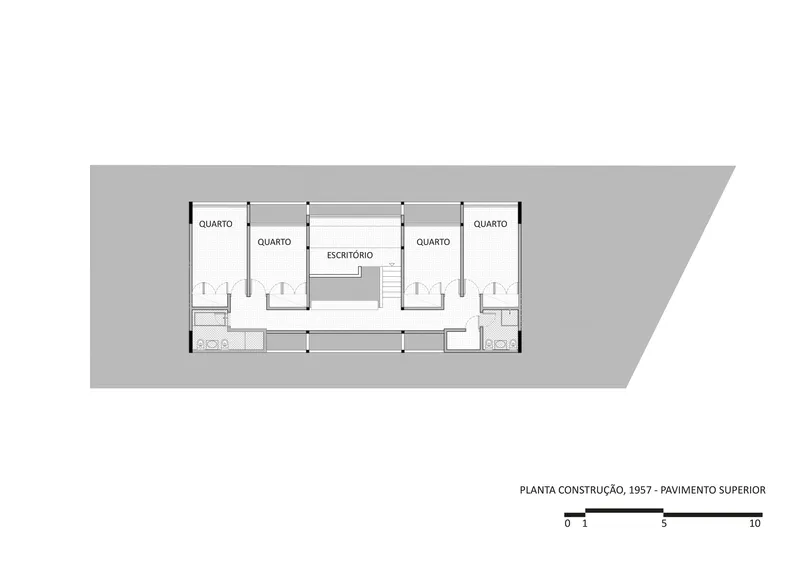 Upper floor plan drawing showing bedroom wing with central office space and flanking bathrooms
