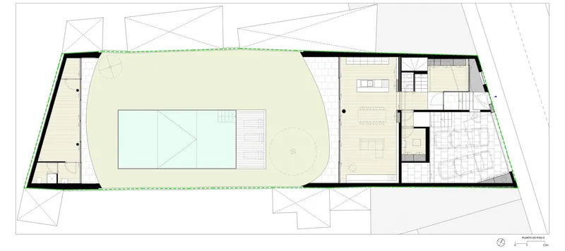 Ground floor plan showing pool, lawn area and interior rooms with kitchen and stair