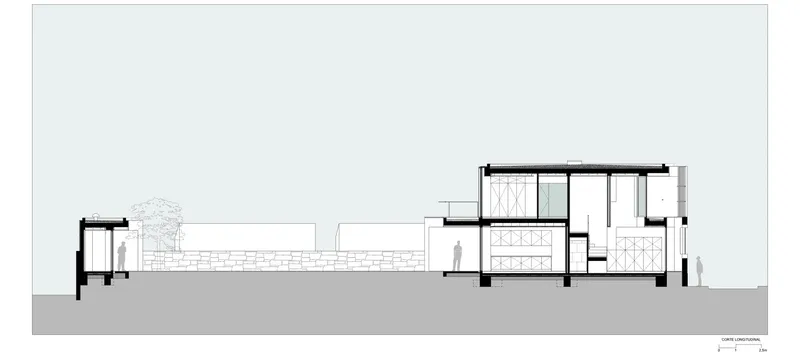 Longitudinal section drawing revealing interior spatial divisions and circulation between split-level volumes