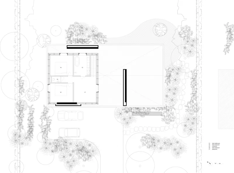 First floor plan drawing indicating bedroom layout and bathroom zones within overall building envelope