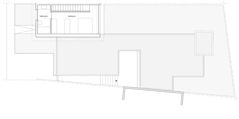 Roof plan drawing displaying terraces and upper level volumes on a sloping site