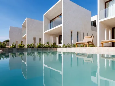 Cuatro Cero Cuatro Arquitectura Lines Up Five Identical Beach Houses on Peru's Northern Coast
