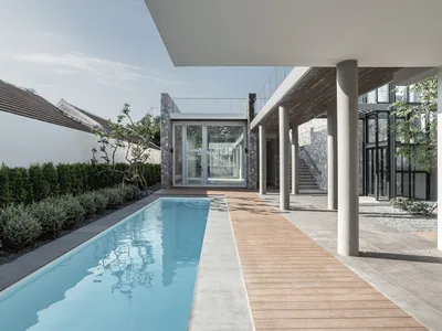 2929 Design Lab Stretches a Walled House Across an 80-Meter Narrow Site in Chiang Mai