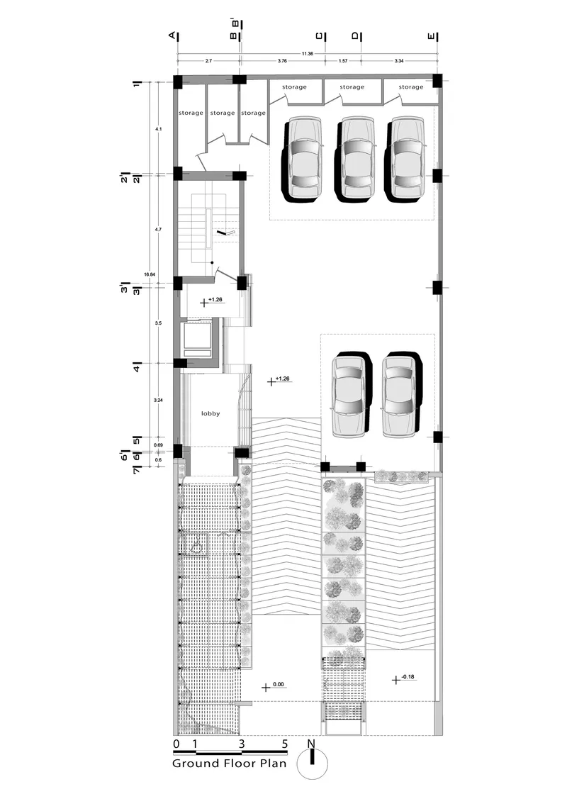 Ground floor plan showing lobby area with stairs and parking spaces arranged in two zones