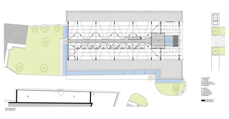 Floor plan and section drawing of a long rectangular hall with skylights and flanking green areas