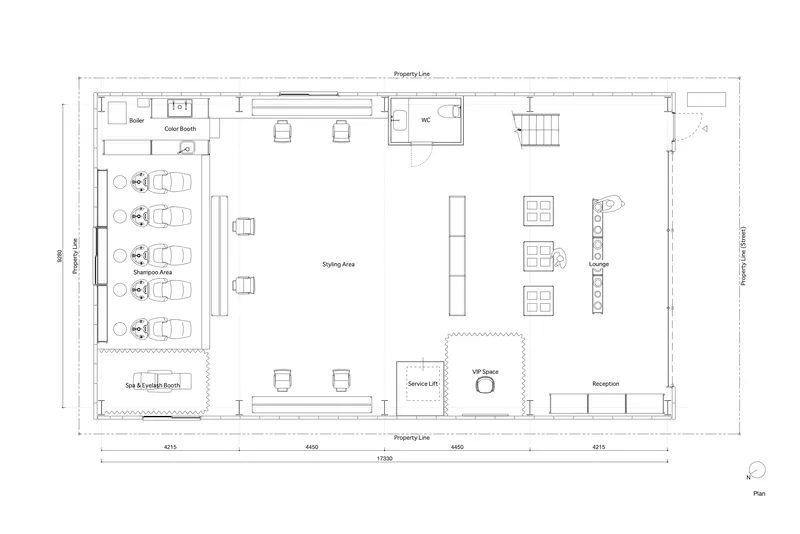 Floor plan showing styling area with scattered workstations and product display tables near the lounge zone