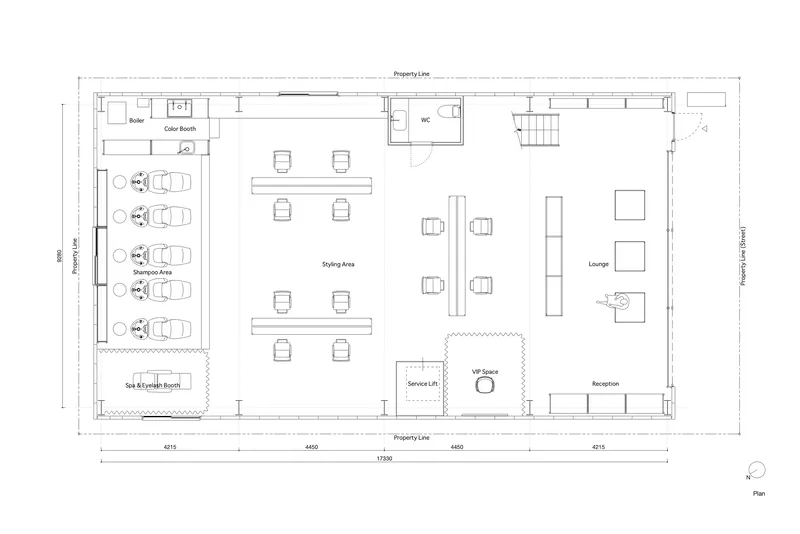 Floor plan showing styling area with paired seating stations and elongated service counter along the center