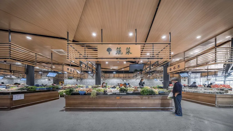 Market hall interior with timber slatted ceiling, black columns and produce displays with shopper