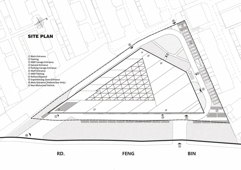 Site plan drawing showing a triangular building footprint with latticed skylight zone and parking areas