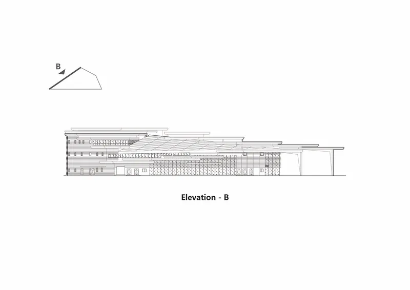 Elevation drawing showing a horizontal multi-story building with stepped rooflines and varied fenestration patterns