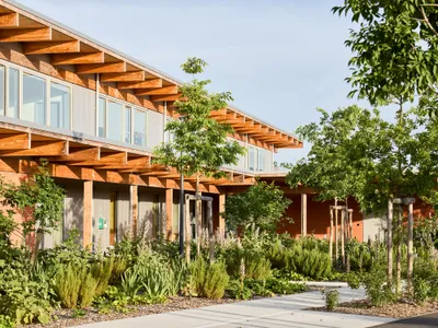 GGR Architectes Anchors a New Neighborhood in Frouzins with a Brick and Timber School Complex