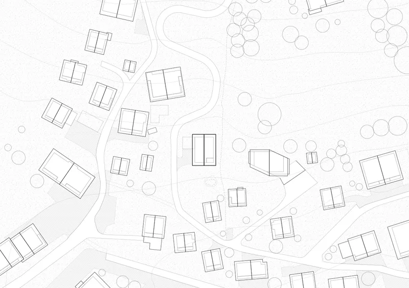 Site plan drawing showing scattered rectangular building footprints along a curving road with trees indicated by circles