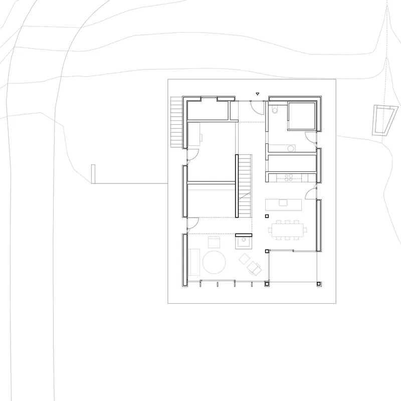 Floor plan drawing showing a square layout with central core, bedrooms, bathroom and open living dining area