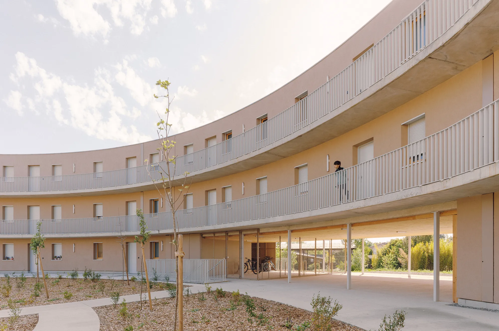 Régis Roudil Wraps 46 Timber-Framed Social Housing Units into a Curved Courtyard Near Toulouse