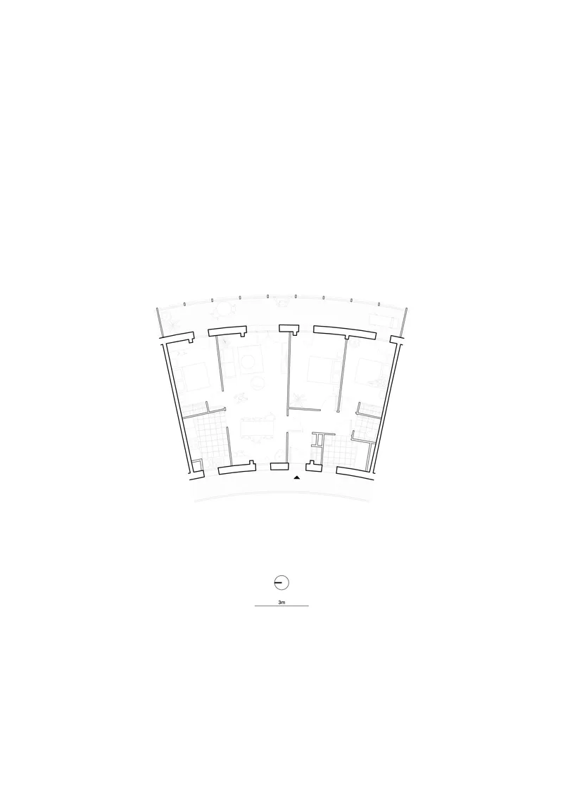 Floor plan drawing showing a dwelling unit with fanning perimeter walls and north orientation marker