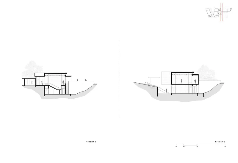 Two section drawings showing staircases connecting levels within the volumes on sloping ground