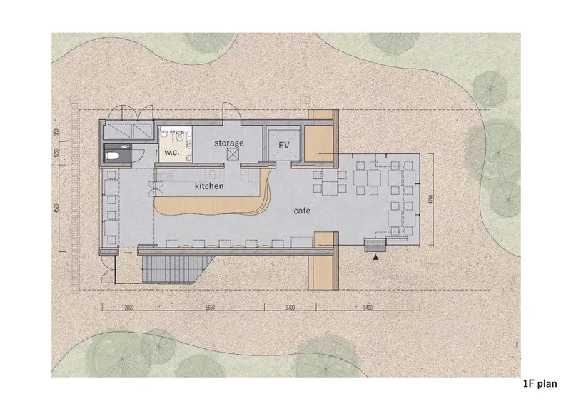 First floor plan drawing showing cafe space with kitchen and service areas in watercolor rendering