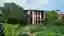 D and P Associates Build a Pi-Shaped House of Rammed Earth Memory on Vietnam's Red River