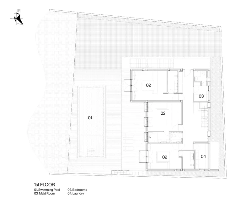 First floor plan drawing showing swimming pool terrace and bedrooms on an angled site