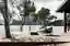 blaq arquitectos Threads a Black Pine Cabin Through the Trees on Chile's Ranco Lake